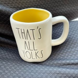 COPY - Rae Dunn "that's all yolks" white yellow text coffee / tea mug